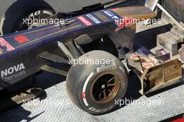 The Scuderia Toro Rosso STR8 of Daniil Kvyat (RUS) Scuderia Toro Rosso Test Driver is recovered back to the pits on the back of a truck. 19.07.2013. Formula One Young Drivers Test, Day 3, Silverstone, England.