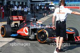 Kevin Magnussen (DEN) McLaren MP4-28 Test Driver running sensor equipment. 17.07.2013. Formula One Young Drivers Test, Day 1, Silverstone, England.