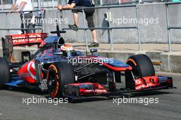 Kevin Magnussen (DEN) McLaren MP4-28 Test Driver running sensor equipment. 17.07.2013. Formula One Young Drivers Test, Day 1, Silverstone, England.