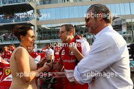 (L to R): Tamara Ecclestone (GBR) with Stefano Domenicali (ITA) Ferrari General Director and Maurizio Arrivabene (ITA) Marlboro Europe Brand Manager on the grid. 03.11.2013. Formula 1 World Championship, Rd 17, Abu Dhabi Grand Prix, Yas Marina Circuit, Abu Dhabi, Race Day.