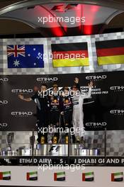 The podium (L to R): Gavin Ward (CDN) Red Bull Racing Race Engineer; Mark Webber (AUS) Red Bull Racing, second; Sebastian Vettel (GER) Red Bull Racing, race winner; Nico Rosberg (GER) Mercedes AMG F1, third. 03.11.2013. Formula 1 World Championship, Rd 17, Abu Dhabi Grand Prix, Yas Marina Circuit, Abu Dhabi, Race Day.