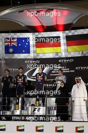 The podium (L to R): Mark Webber (AUS) Red Bull Racing, second; Sebastian Vettel (GER) Red Bull Racing, race winner; Nico Rosberg (GER) Mercedes AMG F1, third. 03.11.2013. Formula 1 World Championship, Rd 17, Abu Dhabi Grand Prix, Yas Marina Circuit, Abu Dhabi, Race Day.