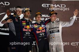 1st place Sebastian Vettel (GER) Red Bull Racing, 2nd place Mark Webber (AUS) Red Bull Racing and 3rd place Nico Rosberg (GER) Mercedes AMG F1 W04. 03.11.2013. Formula 1 World Championship, Rd 17, Abu Dhabi Grand Prix, Yas Marina Circuit, Abu Dhabi, Race Day.
