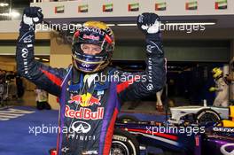 Race winner Sebastian Vettel (GER) Red Bull Racing RB9 celebrates in parc ferme. 03.11.2013. Formula 1 World Championship, Rd 17, Abu Dhabi Grand Prix, Yas Marina Circuit, Abu Dhabi, Race Day.