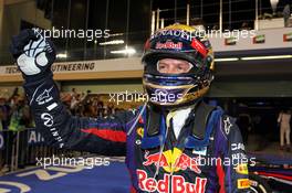 Race winner Sebastian Vettel (GER) Red Bull Racing celebrates in parc ferme. 03.11.2013. Formula 1 World Championship, Rd 17, Abu Dhabi Grand Prix, Yas Marina Circuit, Abu Dhabi, Race Day.