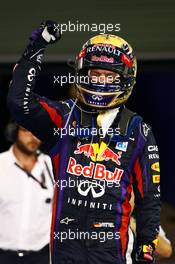 Race winner Sebastian Vettel (GER) Red Bull Racing celebrates in parc ferme. 03.11.2013. Formula 1 World Championship, Rd 17, Abu Dhabi Grand Prix, Yas Marina Circuit, Abu Dhabi, Race Day.