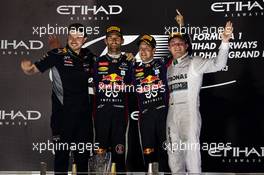 The podium (L to R): Gavin Ward (CDN) Red Bull Racing Race Engineer; Mark Webber (AUS) Red Bull Racing, second; Sebastian Vettel (GER) Red Bull Racing, race winner; Nico Rosberg (GER) Mercedes AMG F1, third. 03.11.2013. Formula 1 World Championship, Rd 17, Abu Dhabi Grand Prix, Yas Marina Circuit, Abu Dhabi, Race Day.