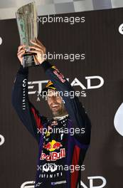 Mark Webber (AUS) Red Bull Racing celebrates his second position on the podium. 03.11.2013. Formula 1 World Championship, Rd 17, Abu Dhabi Grand Prix, Yas Marina Circuit, Abu Dhabi, Race Day.
