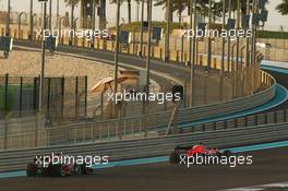 Kimi Raikkonen (FIN) Lotus F1 E21 slows and retires at the start of the race. 03.11.2013. Formula 1 World Championship, Rd 17, Abu Dhabi Grand Prix, Yas Marina Circuit, Abu Dhabi, Race Day.