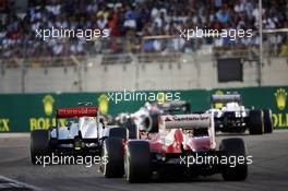 Esteban Gutierrez (MEX) Sauber C32 leads Valtteri Bottas (FIN) Williams FW35, Sergio Perez (MEX) McLaren MP4-28 and Fernando Alonso (ESP) Ferrari F138. 03.11.2013. Formula 1 World Championship, Rd 17, Abu Dhabi Grand Prix, Yas Marina Circuit, Abu Dhabi, Race Day.