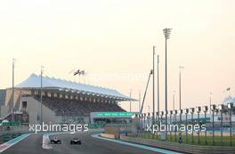 Valtteri Bottas (FIN), Williams F1 Team and Giedo van der Garde (NDL), Caterham F1 Team  03.11.2013. Formula 1 World Championship, Rd 17, Abu Dhabi Grand Prix, Yas Marina Circuit, Abu Dhabi, Race Day.