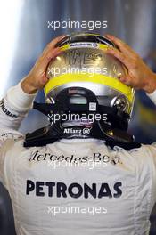Nico Rosberg (GER) Mercedes AMG F1 HANS device and helmet. 02.11.2013. Formula 1 World Championship, Rd 17, Abu Dhabi Grand Prix, Yas Marina Circuit, Abu Dhabi, Qualifying Day.