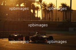 Nico Rosberg (GER) Mercedes AMG F1 W04 leads Jenson Button (GBR) McLaren MP4-28. 02.11.2013. Formula 1 World Championship, Rd 17, Abu Dhabi Grand Prix, Yas Marina Circuit, Abu Dhabi, Qualifying Day.