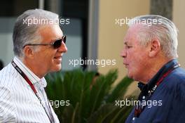 (L to R): Piero Ferrari (ITA) Ferrari Vice-President with Alan Jones (AUS). 02.11.2013. Formula 1 World Championship, Rd 17, Abu Dhabi Grand Prix, Yas Marina Circuit, Abu Dhabi, Qualifying Day.