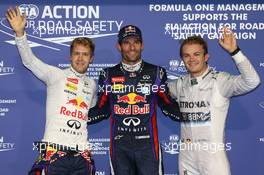 pole for Mark Webber (AUS) Red Bull Racing, 2nd for Sebastian Vettel (GER) Red Bull Racing and 3rd for Nico Rosberg (GER) Mercedes AMG F1 W04. 02.11.2013. Formula 1 World Championship, Rd 17, Abu Dhabi Grand Prix, Yas Marina Circuit, Abu Dhabi, Qualifying Day.