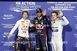 Qualifying top three in parc ferme (L to R): Sebastian Vettel (GER) Red Bull Racing, second; Mark Webber (AUS) Red Bull Racing, pole position; Nico Rosberg (GER) Mercedes AMG F1, third. 02.11.2013. Formula 1 World Championship, Rd 17, Abu Dhabi Grand Prix, Yas Marina Circuit, Abu Dhabi, Qualifying Day.