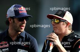 Jean-Eric Vergne (FRA), Scuderia Toro Rosso  and Kimi Raikkonen (FIN), Lotus F1 Team  03.11.2013. Formula 1 World Championship, Rd 17, Abu Dhabi Grand Prix, Yas Marina Circuit, Abu Dhabi, Race Day.