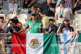 Mexican fans in the grandstand. 03.11.2013. Formula 1 World Championship, Rd 17, Abu Dhabi Grand Prix, Yas Marina Circuit, Abu Dhabi, Race Day.