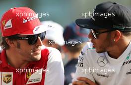Fernando Alonso (ESP), Scuderia Ferrari and Lewis Hamilton (GBR), Mercedes Grand Prix  03.11.2013. Formula 1 World Championship, Rd 17, Abu Dhabi Grand Prix, Yas Marina Circuit, Abu Dhabi, Race Day.