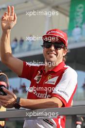 Fernando Alonso (ESP) Ferrari on the drivers parade. 03.11.2013. Formula 1 World Championship, Rd 17, Abu Dhabi Grand Prix, Yas Marina Circuit, Abu Dhabi, Race Day.