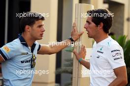 (L to R): Facu Regalia (ARG) GP3 Driver with Daniel Juncadella (ESP) Mercedes DTM Driver. 03.11.2013. Formula 1 World Championship, Rd 17, Abu Dhabi Grand Prix, Yas Marina Circuit, Abu Dhabi, Race Day.