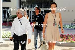 (L to R): Bernie Ecclestone (GBR) CEO Formula One Group (FOM) with Jay Rutland (GBR) and his wife Tamara Ecclestone (GBR). 03.11.2013. Formula 1 World Championship, Rd 17, Abu Dhabi Grand Prix, Yas Marina Circuit, Abu Dhabi, Race Day.