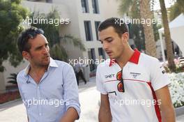 (L to R): Frank Montangy (FRA) Canal+ TV Presenter with Jules Bianchi (FRA) Marussia F1 Team. 03.11.2013. Formula 1 World Championship, Rd 17, Abu Dhabi Grand Prix, Yas Marina Circuit, Abu Dhabi, Race Day.