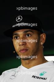 Lewis Hamilton (GBR) Mercedes AMG F1 in the FIA Press Conference. 31.10.2013. Formula 1 World Championship, Rd 17, Abu Dhabi Grand Prix, Yas Marina Circuit, Abu Dhabi, Preparation Day.