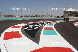 Pit lane entrance at the final corner. 31.10.2013. Formula 1 World Championship, Rd 17, Abu Dhabi Grand Prix, Yas Marina Circuit, Abu Dhabi, Preparation Day.