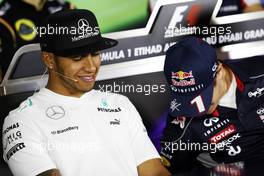 (L to R): Lewis Hamilton (GBR) Mercedes AMG F1 and Sebastian Vettel (GER) Red Bull Racing in the FIA Press Conference. 31.10.2013. Formula 1 World Championship, Rd 17, Abu Dhabi Grand Prix, Yas Marina Circuit, Abu Dhabi, Preparation Day.
