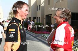 (L to R): Alan Permane (GBR) Lotus F1 Team Trackside Operations Director with Pat Fry (GBR) Ferrari Deputy Technical Director and Head of Race Engineering. 31.10.2013. Formula 1 World Championship, Rd 17, Abu Dhabi Grand Prix, Yas Marina Circuit, Abu Dhabi, Preparation Day.