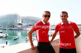 (L to R): Max Chilton (GBR) Marussia F1 Team with Jules Bianchi (FRA) Marussia F1 Team. 31.10.2013. Formula 1 World Championship, Rd 17, Abu Dhabi Grand Prix, Yas Marina Circuit, Abu Dhabi, Preparation Day.