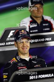 Sebastian Vettel (GER) Red Bull Racing in the FIA Press Conference. 31.10.2013. Formula 1 World Championship, Rd 17, Abu Dhabi Grand Prix, Yas Marina Circuit, Abu Dhabi, Preparation Day.