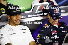 (L to R): Lewis Hamilton (GBR) Mercedes AMG F1 and Sebastian Vettel (GER) Red Bull Racing in the FIA Press Conference. 31.10.2013. Formula 1 World Championship, Rd 17, Abu Dhabi Grand Prix, Yas Marina Circuit, Abu Dhabi, Preparation Day.