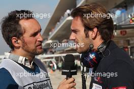 (L to R): Frank Montangy (FRA) Canal+ TV Presenter with Jean-Eric Vergne (FRA) Scuderia Toro Rosso. 15.11.2013. Formula 1 World Championship, Rd 18, United States Grand Prix, Austin, Texas, USA, Practice Day.