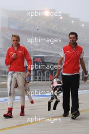 Max Chilton (GBR) Marussia F1 Team with Sam Village (GBR) Marussia F1 Team. 15.11.2013. Formula 1 World Championship, Rd 18, United States Grand Prix, Austin, Texas, USA, Practice Day.