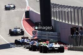 The cars leave the pits. 15.11.2013. Formula 1 World Championship, Rd 18, United States Grand Prix, Austin, Texas, USA, Practice Day.