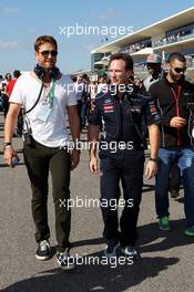 Christian Horner (GBR) Red Bull Racing Team Principal on the grid with Gerard Butller (GBR) Actor. 17.11.2013. Formula 1 World Championship, Rd 18, United States Grand Prix, Austin, Texas, USA, Race Day.
