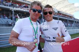 (L to R): Gordon Ramsey (GBR) Celebrity Chef with Max Chilton (GBR) Marussia F1 Team. 17.11.2013. Formula 1 World Championship, Rd 18, United States Grand Prix, Austin, Texas, USA, Race Day.