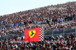 Fans and a Ferrari flag. 17.11.2013. Formula 1 World Championship, Rd 18, United States Grand Prix, Austin, Texas, USA, Race Day.