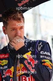 Sebastian Vettel (GER) Red Bull Racing on the grid. 17.11.2013. Formula 1 World Championship, Rd 18, United States Grand Prix, Austin, Texas, USA, Race Day.