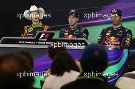 The FIA Press Conference (L to R): Romain Grosjean (FRA) Lotus F1 Team, second; Sebastian Vettel (GER) Red Bull Racing, race winner; Mark Webber (AUS) Red Bull Racing, third. 17.11.2013. Formula 1 World Championship, Rd 18, United States Grand Prix, Austin, Texas, USA, Race Day.