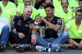 (L to R): Adrian Newey (GBR) Red Bull Racing Chief Technical Officer passes over the bottle of Jagermeister to Mark Webber (AUS) Red Bull Racing at the team celebration. 17.11.2013. Formula 1 World Championship, Rd 18, United States Grand Prix, Austin, Texas, USA, Race Day.
