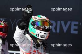 Sergio Perez (MEX) McLaren celebrates in parc ferme. 17.11.2013. Formula 1 World Championship, Rd 18, United States Grand Prix, Austin, Texas, USA, Race Day.