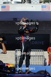 Race winner Sebastian Vettel (GER) Red Bull Racing RB9 celebrates in parc ferme. 17.11.2013. Formula 1 World Championship, Rd 18, United States Grand Prix, Austin, Texas, USA, Race Day.