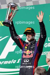 Mark Webber (AUS) Red Bull Racing celebrates his third position on the podium. 17.11.2013. Formula 1 World Championship, Rd 18, United States Grand Prix, Austin, Texas, USA, Race Day.