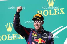 Race winner Sebastian Vettel (GER) Red Bull Racing celebrates on the podium. 17.11.2013. Formula 1 World Championship, Rd 18, United States Grand Prix, Austin, Texas, USA, Race Day.