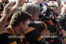 Romain Grosjean (FRA) Lotus F1 Team celebrates his second position with the team in parc ferme. 17.11.2013. Formula 1 World Championship, Rd 18, United States Grand Prix, Austin, Texas, USA, Race Day.