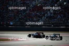 Jean-Eric Vergne (FRA) Scuderia Toro Rosso STR8 leads Esteban Gutierrez (MEX) Sauber C32. 17.11.2013. Formula 1 World Championship, Rd 18, United States Grand Prix, Austin, Texas, USA, Race Day.