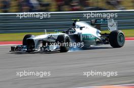 Lewis Hamilton (GBR) Mercedes AMG F1 W04 locks up under braking. 17.11.2013. Formula 1 World Championship, Rd 18, United States Grand Prix, Austin, Texas, USA, Race Day.